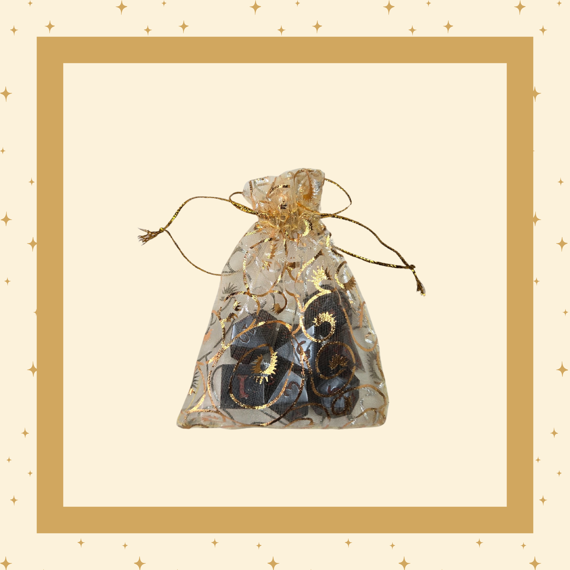 A sheer drawstring pouch with gold swirling patterns, containing a set of resin black polyhedral Dungeons & Dragons dice with red numbering. The pouch is tied with a gold string, partially revealing the dice inside.