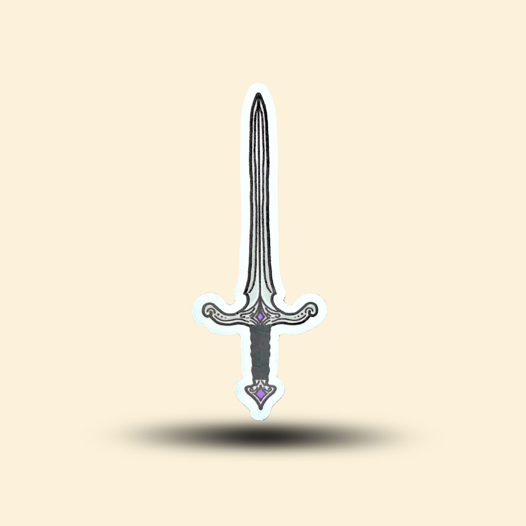 Fantasy sword sticker. Silver blade with a black handle and purple gem hilt.